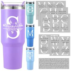 the purple and blue tumbler is next to some type of decal on it