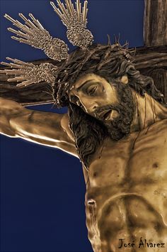 the crucifix has been painted gold and silver