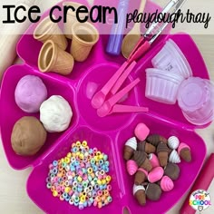 an ice cream playdough tray filled with candy, candies and crayons