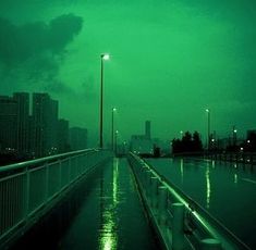 an empty street at night in the rain