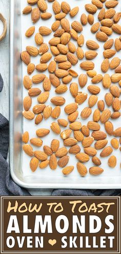 almonds on a baking sheet with the title how to toast almonds oven skillet