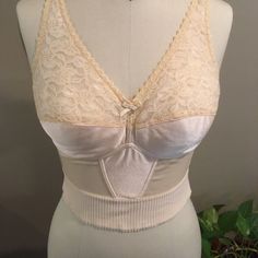 Nwot “Almost U “ Beige Longline Bra With Pocket Opening For For Inserts. New. Never Worn. Back Has Hook And Eye Opening. Straps Are Adjustable. Elastic Band At Waist For Contour Fit. Size 38c ( Shown On Smaller Size 8 Mannequin). Very Soft And Flexible...Ll Note: Two Of These Bras Are Available...Priced Separately...Ll Beige Fitted V-neck Camisole, Fitted Cream Camisole With Built-in Bra, Fitted Lace Camisole Bra, Lace Camisole Bra, Fitted Underbust Bra Partially Lined, Feminine Fitted Camisole For Daywear, Fitted Sleeveless Tops Partially Lined, Beige Bra For Daywear, Fitted Bra-friendly Camisole In Coquette Style