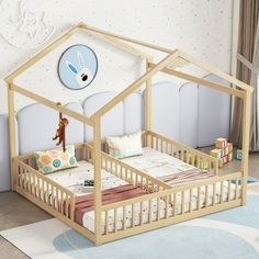 a child's bed with a wooden frame and mattress