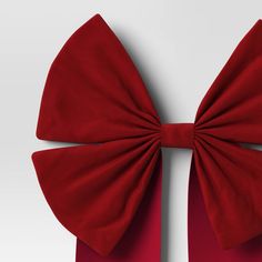 a close up of a red bow tie