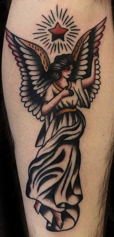 an angel tattoo on the leg of a man