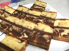 slices of cake sitting on top of a white plate