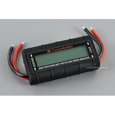 the lcd battery charger is connected to an orange cord