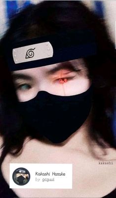 a woman wearing a black mask with an eye patch on her face