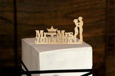 a wedding cake topper that says mr and mrs