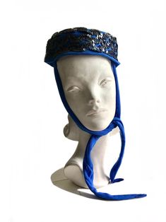 "a unique vintage 1940s blue pillbox hat with attached head scarf the pillbox shaped hat is made of blue wool and has a scarf attached to the back of the hat and is made of soft stretch jersey. the scarf part can be tied to the front. the hat has a beautiful almost cobalt blue color and the hat is adorned with sparkling black sequins all around the rim of the hat. a nice hat to keep you warm in the winter and look very stylish at the same time. label: Union label made in USA in near Mint Pristin Pillbox Hat, Pill Boxes, Cool Hats, Blue Wool, Winter Hat, Black Sequins, Head Scarf, Special Offer, Cobalt Blue