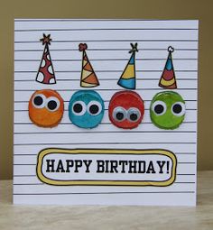 a birthday card with three little monsters wearing party hats