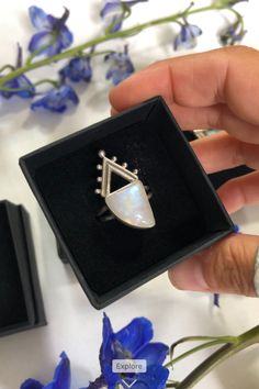 Glowing moonstone crown ring. Handcrafted in sterling silver to create a regal, powerful design with an ethereal feel. Trinity Ring