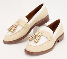 The loafer is a classic shoe that will never go out of style. Slip your feet into them and show off the chic tassel detail.  The best part about these beauties? They pair well with nearly any outfit. Wear them with a sweater and jeans, a button-front blouse and mini skirt, or a flowy printed dress. This preppy look will last throughout the seasons. From Franco Sarto. Trendy Tassel Loafers With Round Toe For Fall, Spring Tassel Slip-on Loafers, Fall Office Tassel Loafers With Brogue Detailing, Trendy Leather Tassel Loafers For Fall, Classic Fall Tassel Loafers With Flat Heel, Trendy Beige Fall Loafers, Fall Workwear Tassel Loafers With Brogue Detailing, Chic Spring Loafers With Tassels, Spring Casual Tassel Loafers With Brogue Detailing