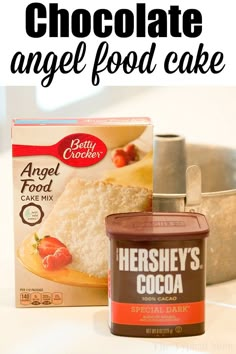 chocolate angel food cake next to a carton of hershey's cocoa powder