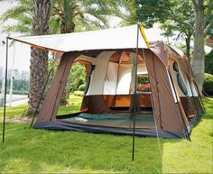 a tent is set up in the grass