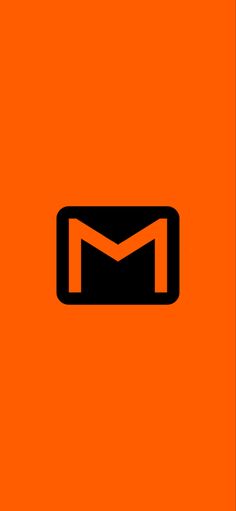 an orange and black icon with the letter m