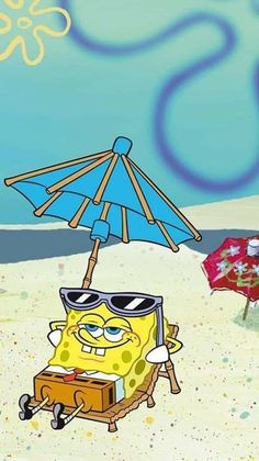 spongebob on the beach under an umbrella