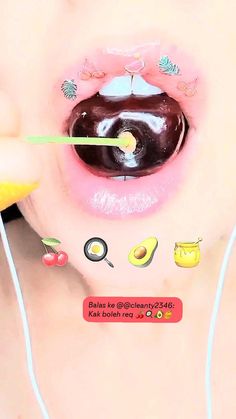 an image of a woman with food on her lips and earphones attached to her nose