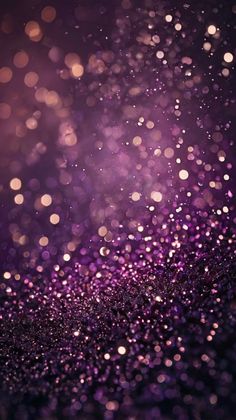 purple and gold glitter wallpaper with blurry lights