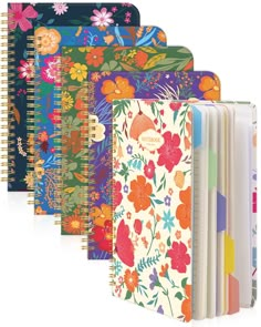 five notebooks lined up in different colors and designs, each with a floral design