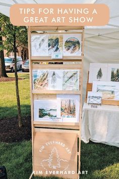 an outdoor art display with the words tips for having a great art show on it