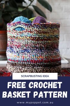 a crochet basket sitting on top of a rug next to a potted plant