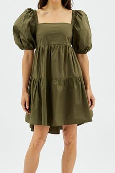 tiered babydoll poplin dress in a deep olive green with a fun bow tie detail in back and a statement puff sleeve 0-4 extra small, 6-8 small, 10-12 medium, 14 large 100% cotton machine wash cold, hang to dry Khaki Mini Dress, Minkpink Dress, Grunge Dress, Poplin Dress, Khaki Dress, Mink Pink, Dress Purchase, Gorgeous Fabrics, Smock Dress