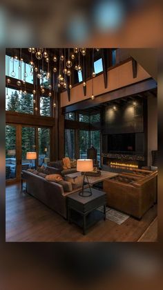 a living room filled with lots of furniture next to a fire place in a building