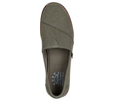 Easy-wearing classic style and comfort combine in BOBS from Skechers Chill Lugs - Familiar Turf. This casual vegan design features a washed canvas upper with decorative 'patch-look' stitching details, a mini V-notched gore instep panel, Skechers Memory Foam insole, plus a lightweight, lug-look flexible traction outsole. For every BOBS purchase, a donation is made to animals in need. | Skechers Women's BOBS Chill Lugs - Familiar Turf Slip-On Shoes | Medium Width | Skechers Memory Foam cushioned c Vegan Design, Hiking Training, Skechers Memory Foam, Lace Up Wedges, Shoes Flats Sandals, Stitching Details, Skechers Women, School Shoes, Athletic Sneakers