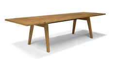 a wooden table sitting on top of a white floor