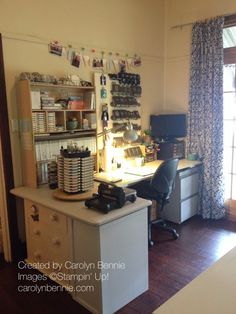 a room with a desk and shelves filled with items