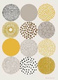 an art print with different circles and dots on the bottom, in various shades of yellow