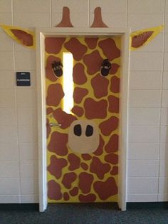 a giraffe door is decorated to look like it has been painted