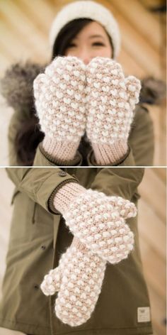 a woman wearing knit mittens while standing in front of a wooden wall and holding her hands up to the camera