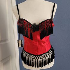 Nwt Vintage Chantal Thomass X Victoria Secret Red Satin Corset Top With Black Fringe Size 34b. Hook And Eye Back Closure, This Is Such A Special And Unique Top Purchased 17+ Years Ago That I Never Got The Chance To Wear. In Perfect Condition. I Coveted This Top For A Long Time And Finally Bought It To Wear As A Moulin Rouge Themed Party But Sadly Never Wore It. Size Is A 34b And Fits True To Size. Red Evening Corset With Boning, Red Underwire Corset For Party, Red Underbust Corset For Evening, Red Evening Corset, Red Underwire Party Corset, Red Evening Underbust Corset, Red Satin Corset, Red And Black Corset Top, Red Velvet Corset Top