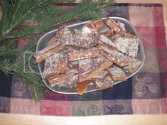 a plate full of pretzels sitting on top of a checkered table cloth