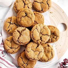 a white plate topped with cookies on top of a table