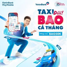 a man holding up a smart phone in front of a poster for taxi bao ca thang