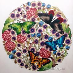 a painting of butterflies and flowers in a circle