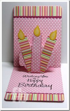 a birthday card with two candles on it