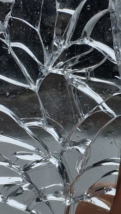 a close up of a broken glass window