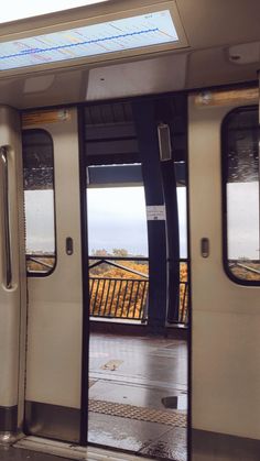 an open door on a train car with the doors opened