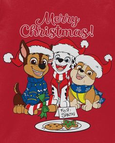 a red shirt with two dogs wearing santa hats