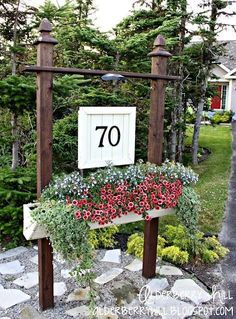 an outdoor space with flowers and plants in the center, on top of a sign that reads how to clean and organize outdoor spaces