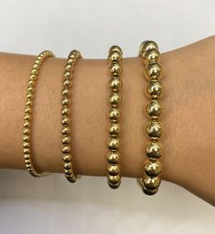 These beautiful 14k gold ball bracelets are a perfect casual chic style that's going to be added to your collection!  They come in 4 different millimeters in 14k yellow gold. All lengths are 7.5'' with 8'' extension with lobster lock  Real 14k  Not plated  Weight : 3mm -3.7g 4mm -3.3g 6mm -11.5g 7.7mm- 14.6g Ball Bracelet, Casual Chic Style, Solid Yellow, Arm Band, Halloween Shopping, Casual Chic, Chic Style, Jewelry Bracelets, Accessory Gift