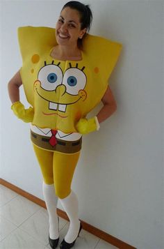 a woman dressed as spongebob poses for the camera with her arms behind her back