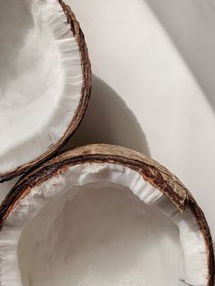 two pieces of coconut sitting next to each other