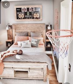 a bedroom with a basketball hoop in the corner