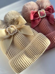 Dolly Bow Knitted PomPom Hat with velvet embellish Bow Available in two beautiful colours  Dusky Pink & Cream Suitable for ages 1-5Years  @dollybow Pom Pom Bow, Baby Knits, Dusky Pink, Beautiful Colours, Pom Pom Hat, Girl With Hat, Baby Knitting, Caps Hats, Beautiful Colors