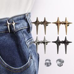 four pairs of metal studs on the back of a pair of jeans with two different colors